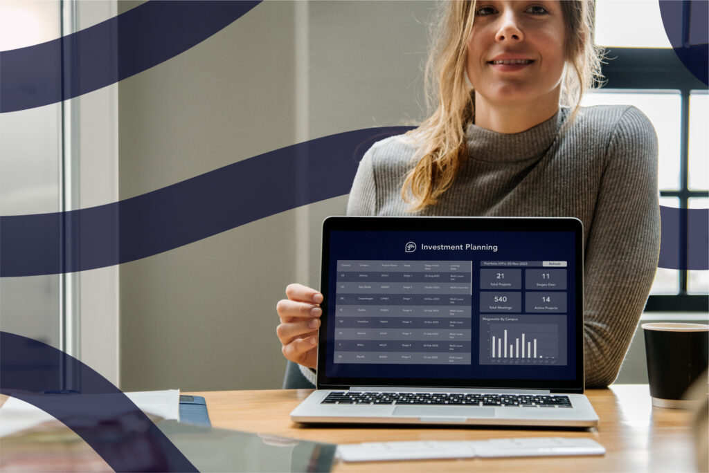 Blond woman touching a laptop