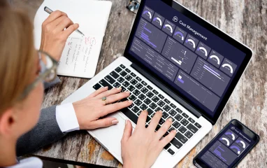 cost-management-woman-typing-in-a-laptop-showing-charts